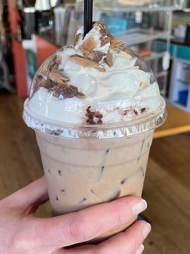 heath bar iced latte with whipped cream