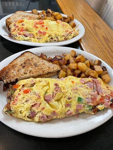 ham pepper cheese onion omelette with wheat toast and home fries